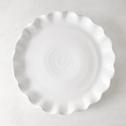 White Onda Round Ceramic Serving Platter, 20"Dia, with a playful ruffled edge.