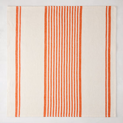 Orange Boat Stripe Napkin, 22" square, cotton-linen blend, with vertical orange stripes on cream.