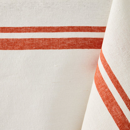 Orange Boat Stripe Tablecloth, 70"L x 108"W, cotton-linen blend with red stripes.