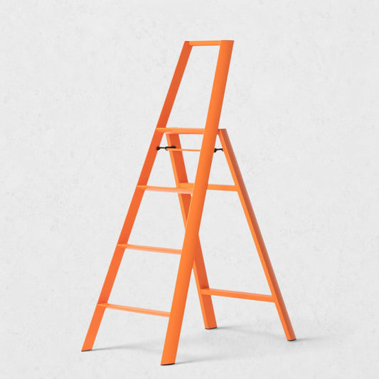 Hudson Grace orange Hasegawa Lucano 4-step ladder with a minimalist aluminum and steel design and safety bar