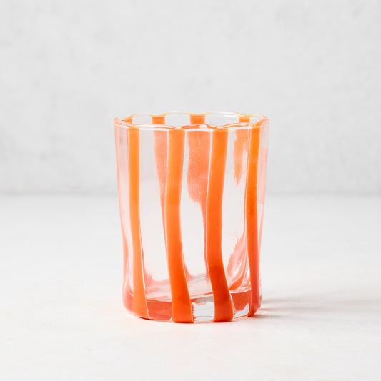 Hand-made Italian glass Double Old Fashioned with vertical orange stripes.