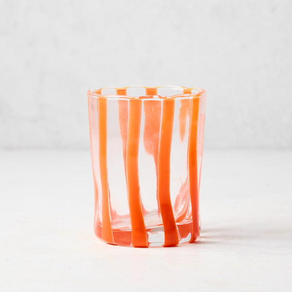 Hand-made Italian glass Double Old Fashioned with vertical orange stripes.