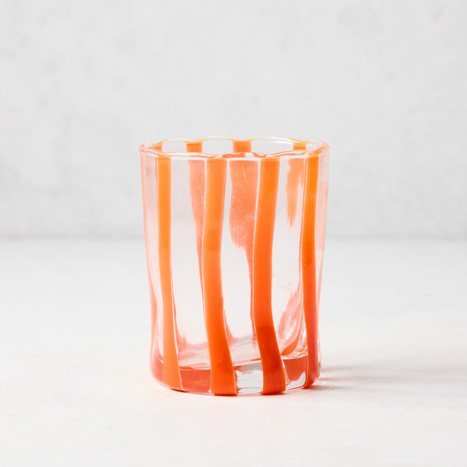 Hand-made Italian glass Double Old Fashioned with vertical orange stripes.