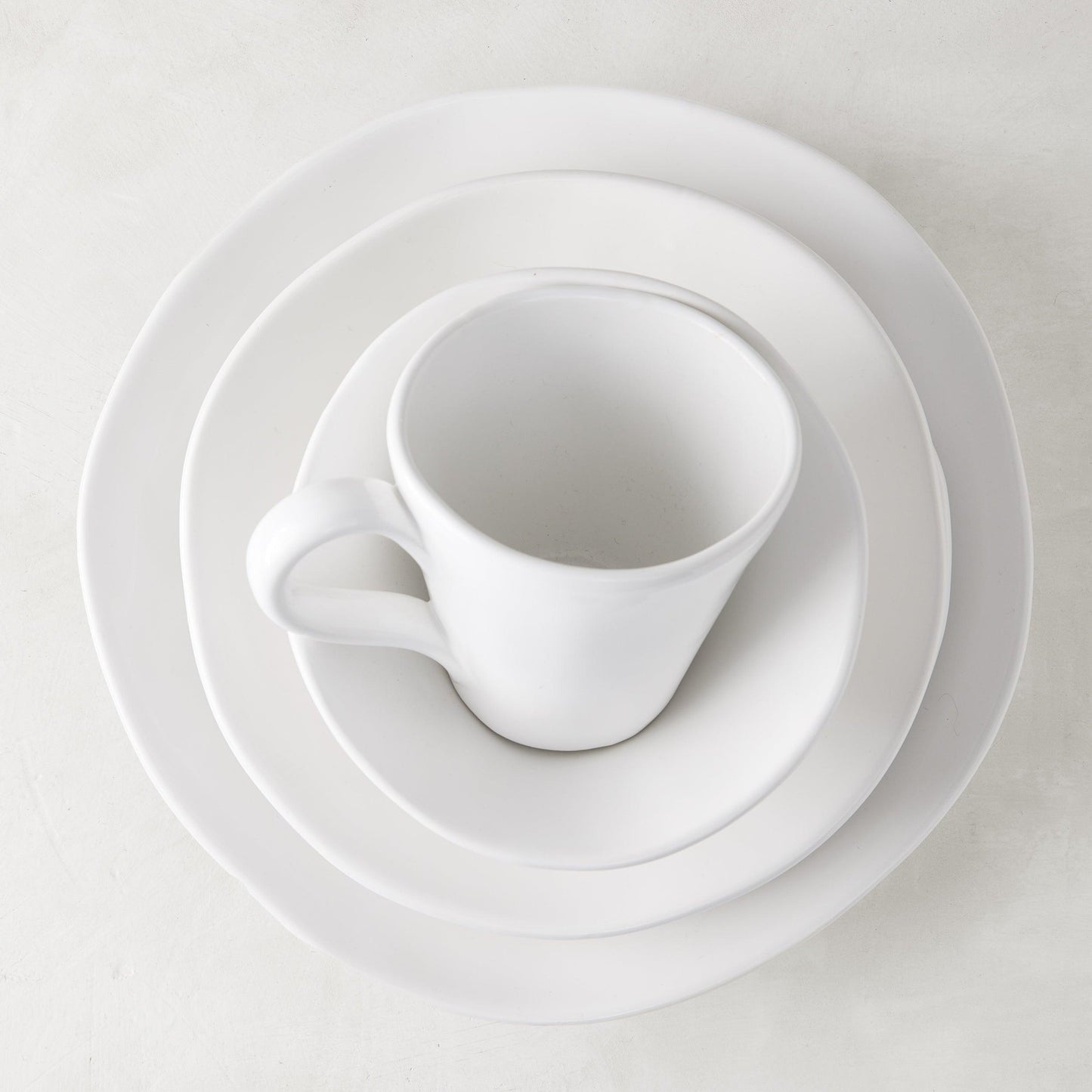 Organic Ceramic Collection creamy white breakfast bowl, 6.5" diameter, with subtle organic edges.