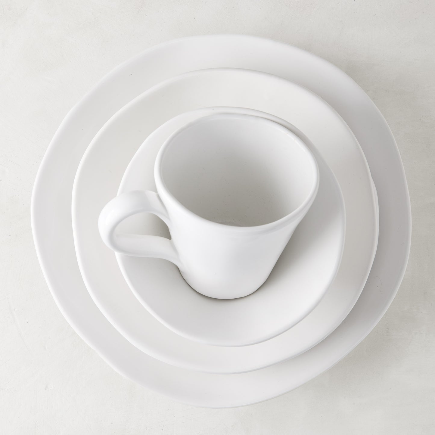 Organic Ceramic Collection low bowl, creamy white, 9" diameter, with subtle organic edges.