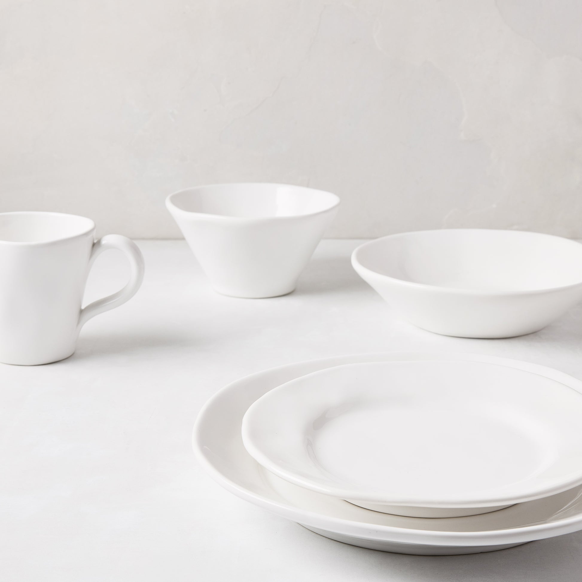 White ceramic Organic Salad Plate, 9" diameter, with subtle organic edges and creamy glaze.