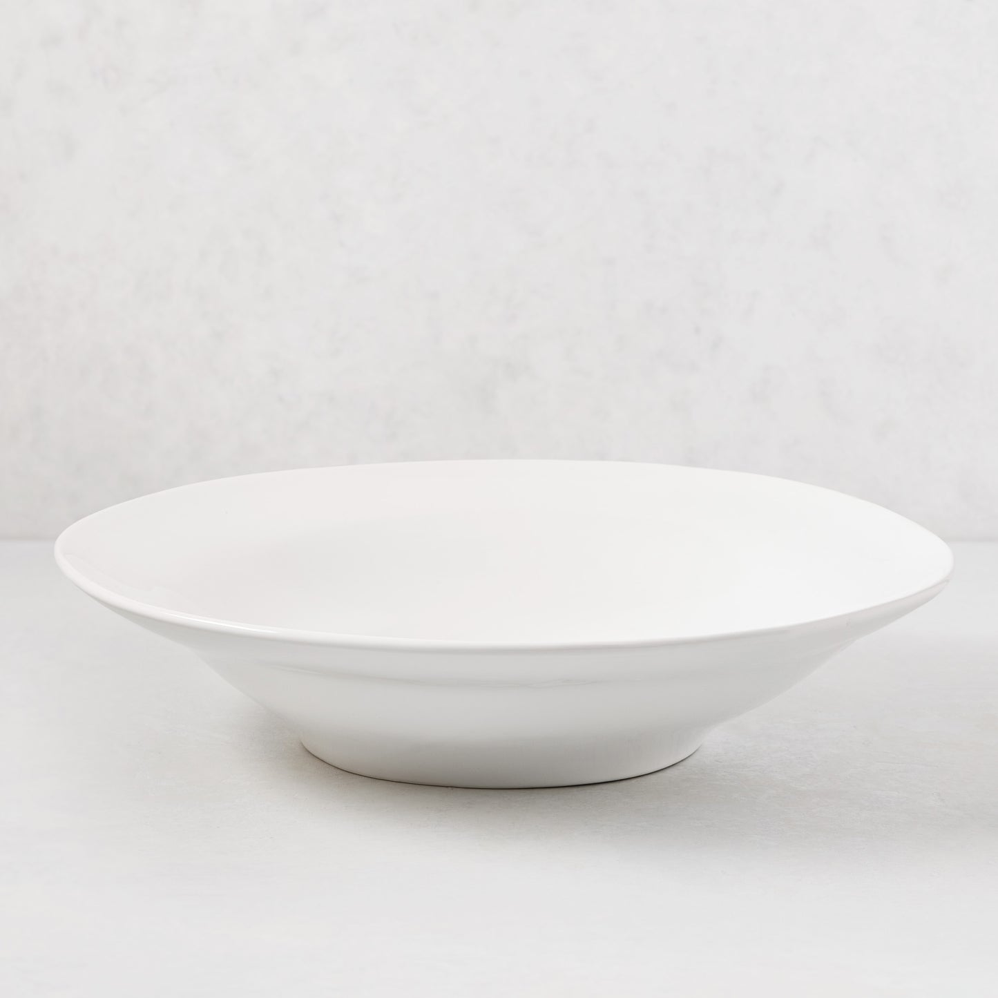 Organic Ceramic Serve Bowl, 16" diameter, creamy white glaze, subtle organic edges.