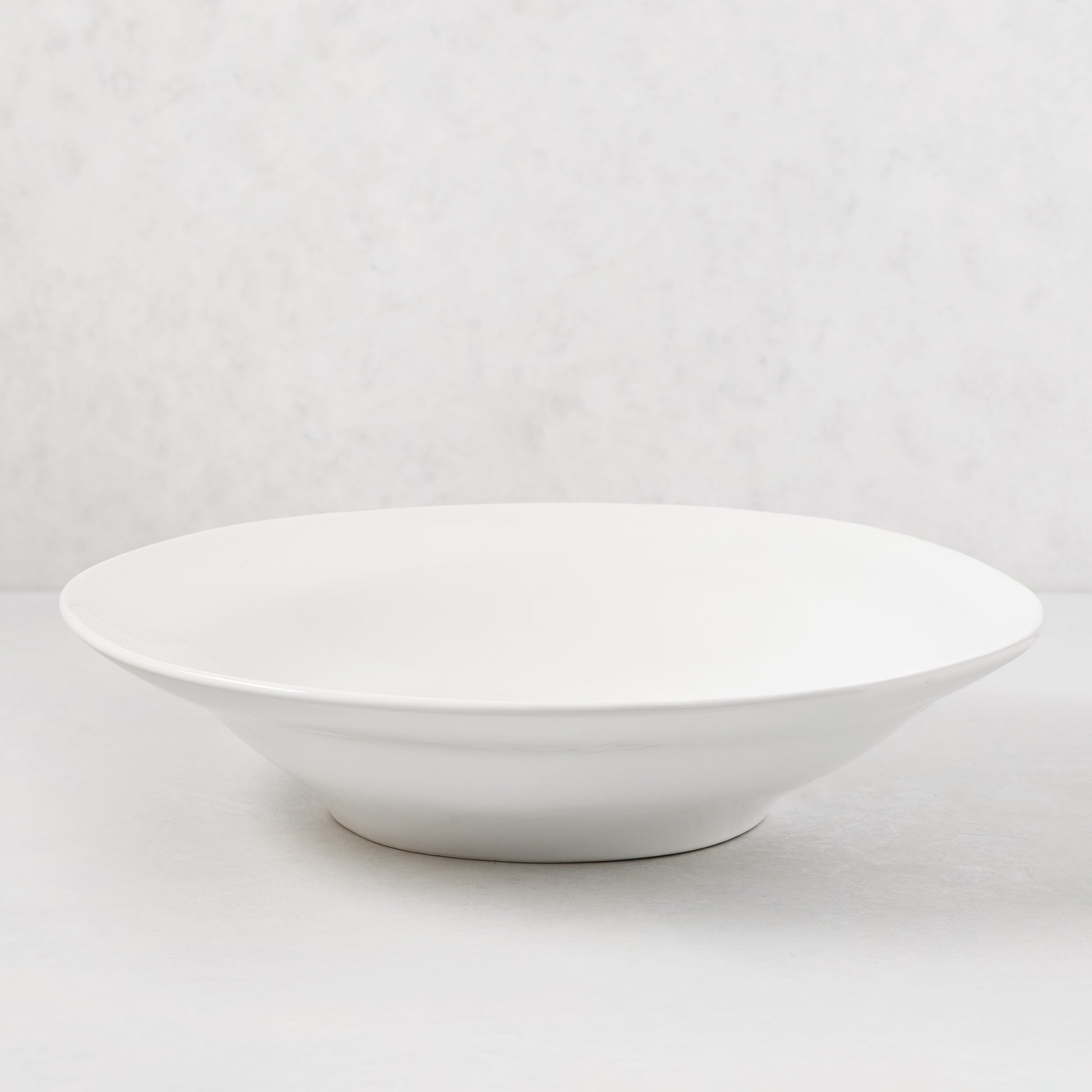 Organic Ceramic Serve Bowl, 16" diameter, creamy white glaze, subtle organic edges.