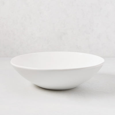 Organic Flared Ceramic Serve Bowl, creamy white, 12" diameter, subtle organic edges.