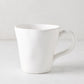 Organic White Ceramic Mug, 10 oz, with subtle organic edges and creamy white glaze.