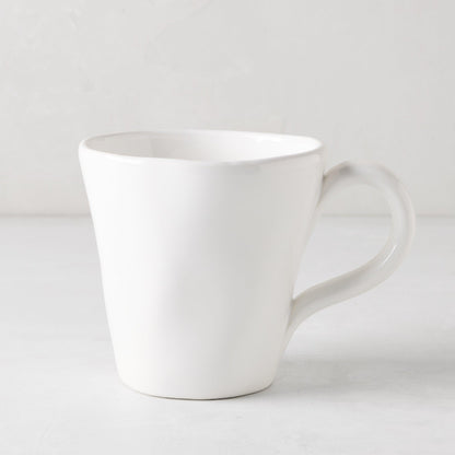 Organic White Ceramic Mug, 10 oz, with subtle organic edges and creamy white glaze.