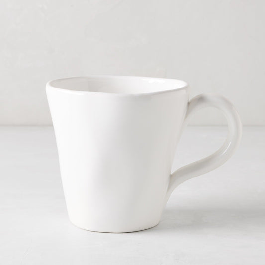 Organic White Ceramic Mug, 10 oz, with subtle organic edges and creamy white glaze.
