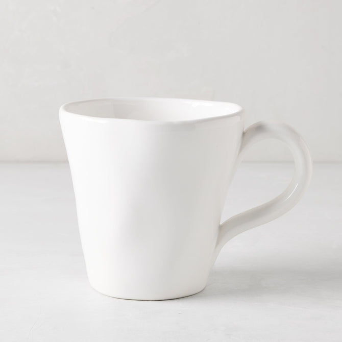 Organic White Ceramic Mug, 10 oz, with subtle organic edges and creamy white glaze.