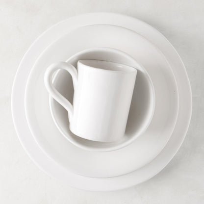 HG Original 10" creamy white ceramic bowl with a smaller bowl and mug stacked inside.