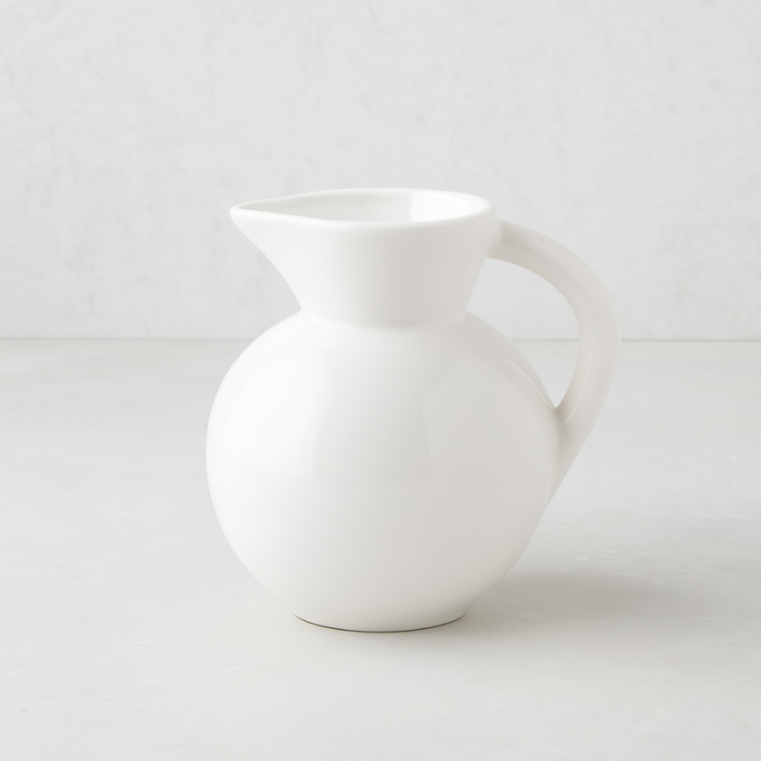 HG Original small round ceramic pitcher in creamy white glaze.