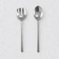 Orleans 2-piece serving set in polished 18/10 stainless steel with hammered handles and rounded ends.