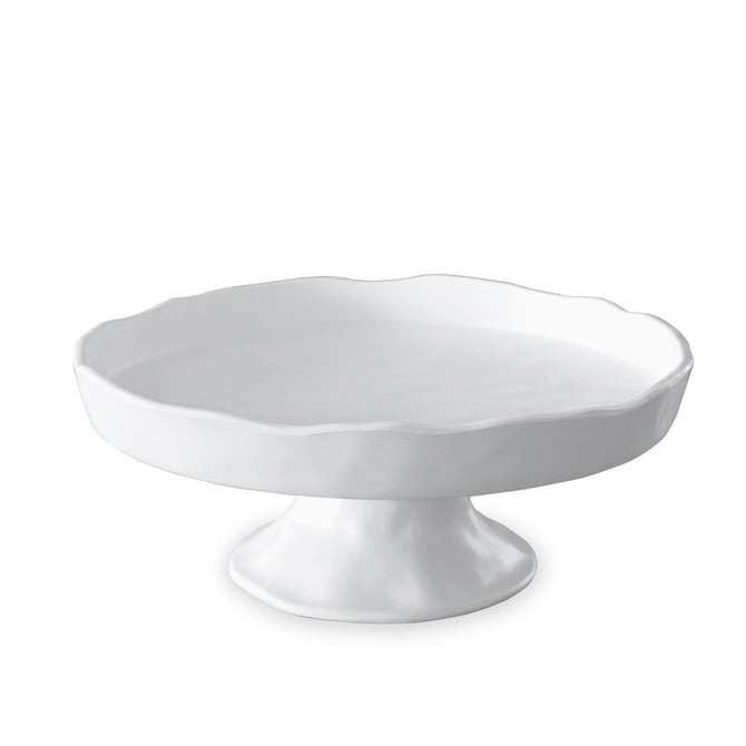 White melamine cake stand with a sculptural, wavy edge, 12.75" diameter.