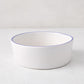 Pacific Blue-Rimmed Stoneware Soup Bowl, 6" diameter, white with hand-painted blue edge, irregular shape.