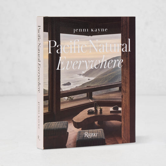 Jenni Kayne's "Pacific Natural Everywhere" hardcover book, featuring a coastal home interior with ocean views.