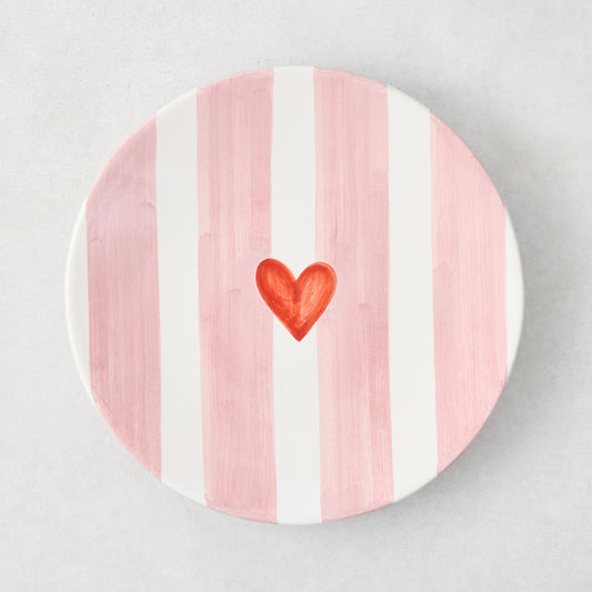 Hand-painted Italian stoneware salad plate with pale pink stripes and a red heart.
