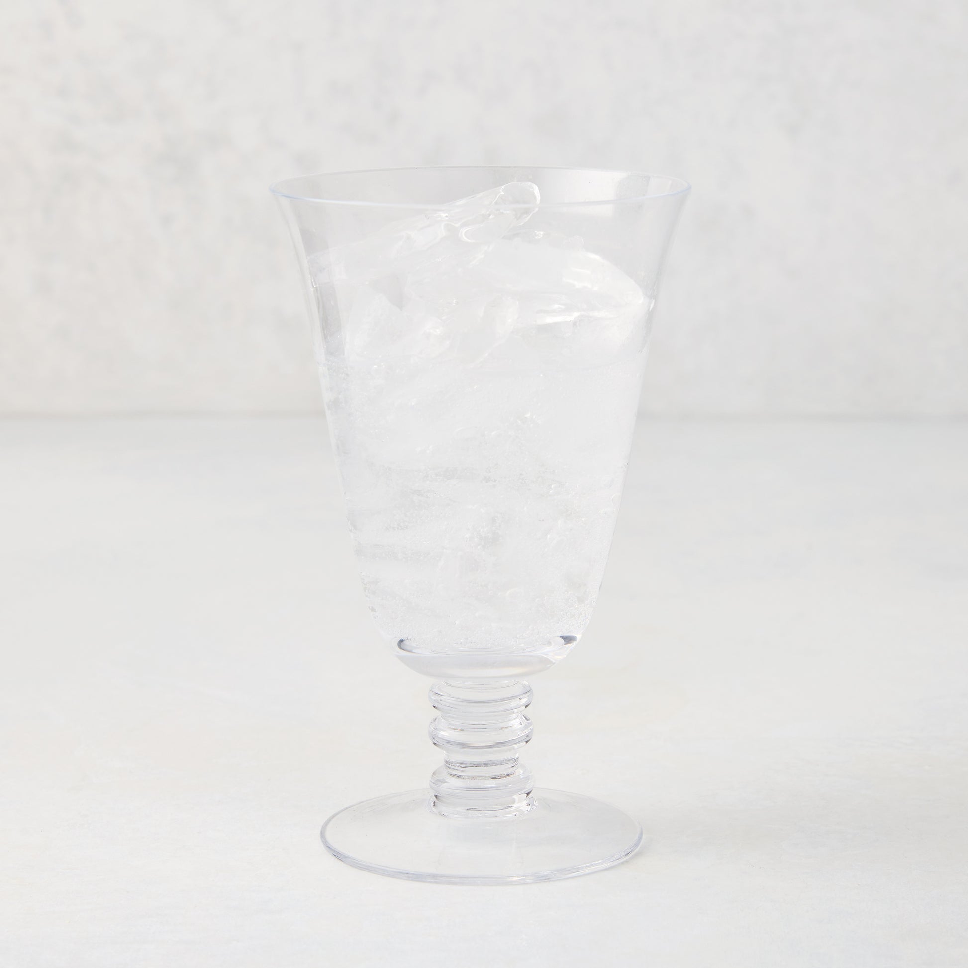 Palermo Stemmed Water Glass, clear hand-blown glass with curved lip and artistic stem, 6.7"H.