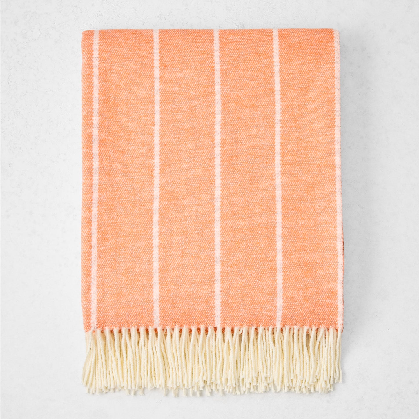 Papaya Orange Fiji Stripe Throw Blanket, 50% Cotton, 50% Acrylic, with fringe.