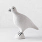 Handcrafted white paper mache turtledove figurine with a textured finish and dark grey beak and feet.