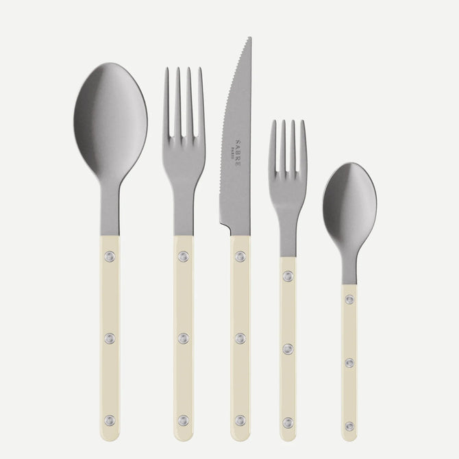 Paris Bistro Vintage Finish 5-piece flatware set with stainless steel and cream acrylic handles.
