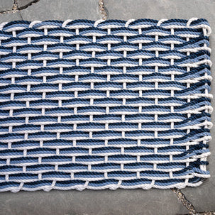 Pearl, Glacier Bay, and Navy braided rope doormat, handwoven, rectangular.