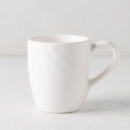 Pebble White ceramic mug with a creamy glaze and subtle textures, 10.14oz.