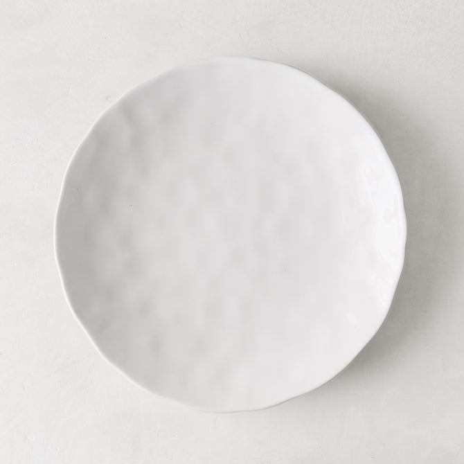 Pebble White ceramic salad plate, 8.5" diameter, with subtle textures and creamy white glaze.