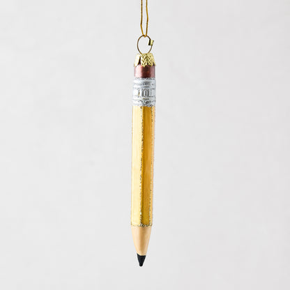 Hand-painted glass pencil ornament with yellow body, silver glitter accents, and a gold hanging loop.