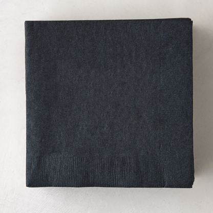 Stack of 50 personalized black 5.5" square 3-ply paper cocktail napkins.
