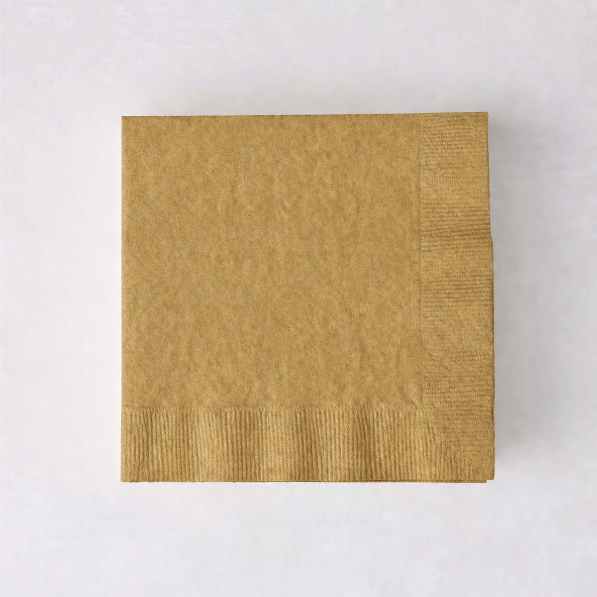 Square 5.5-inch gold paper cocktail napkin with a textured border on a white background.