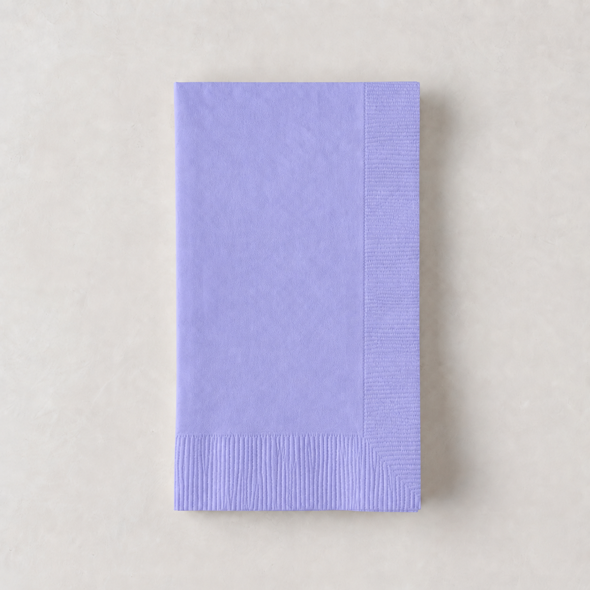 Lavender purple 3-ply disposable paper hand towel with a textured border on a light background.