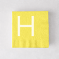 Personalized pale yellow 5.5-inch square paper cocktail napkin with a white letter H monogram.