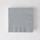 Square silver 3-ply paper cocktail napkin with embossed border detail on a white background.