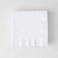 Square 5.5-inch white 3-ply paper cocktail napkin with a textured border on a light background.