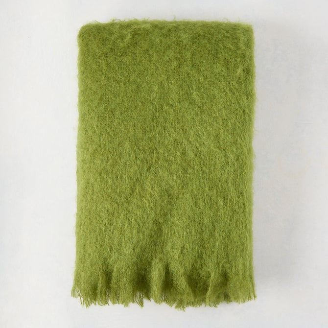 Pesto Green Solid Mohair Throw Blanket, 72"L x 51"W, with fringed edge.