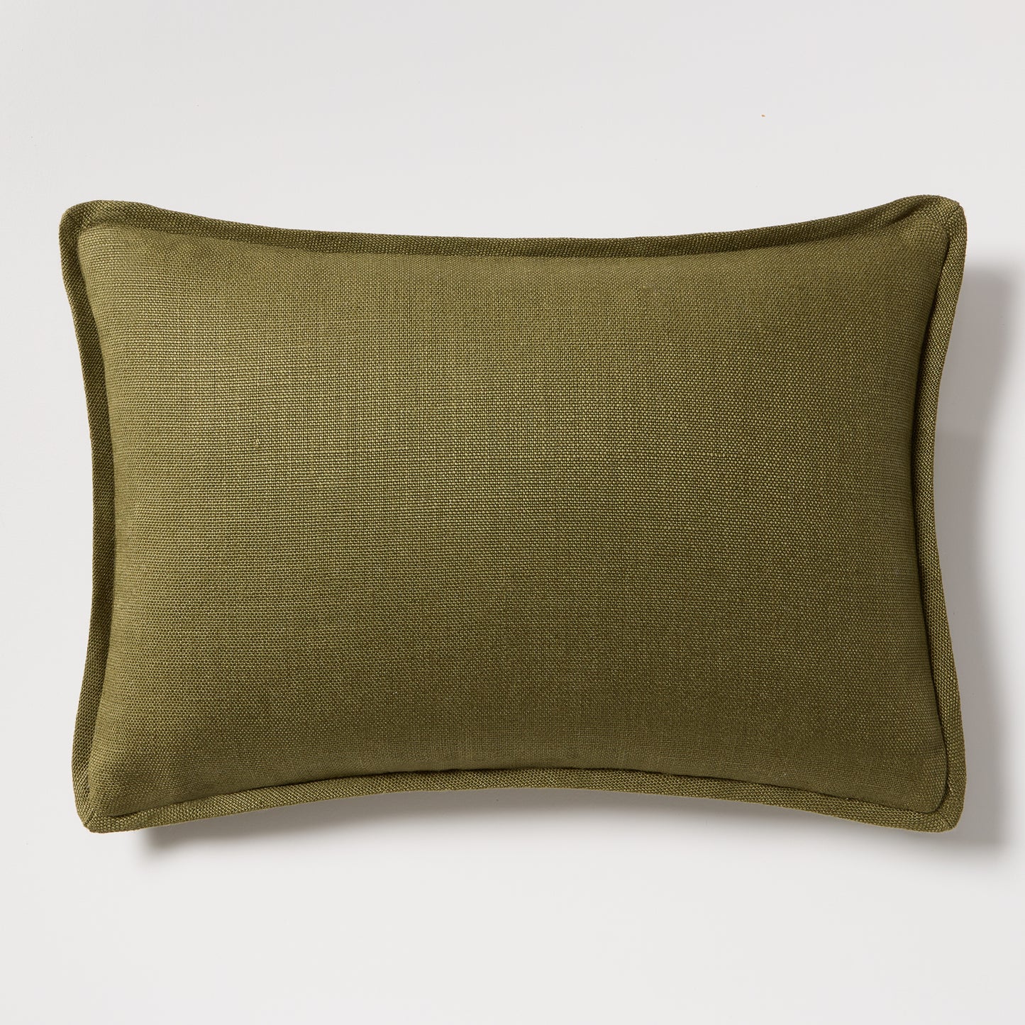 Pesto green tonal reversible velvet and linen lumbar pillow, 20"L x 14"H, with a hidden zipper.