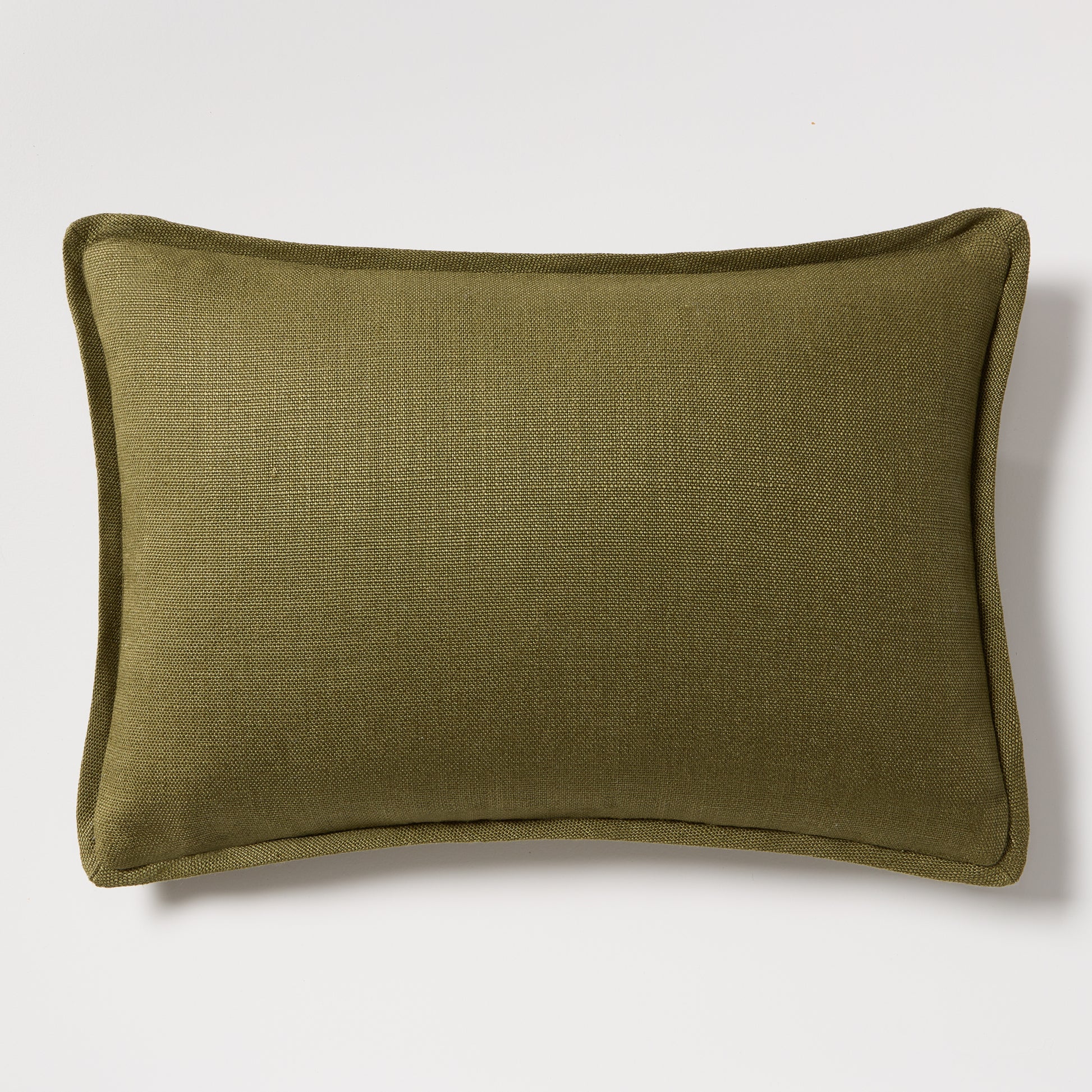 Pesto green tonal reversible velvet and linen lumbar pillow, 20"L x 14"H, with a hidden zipper.