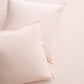 Set of 2 Petal Pink Italian Percale Euro Shams with envelope closures.