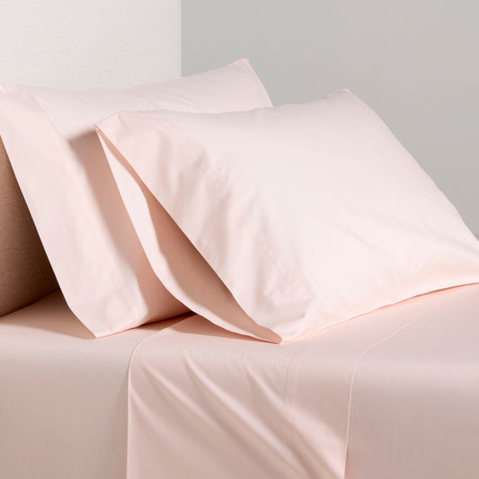 Petal Pink Italian Percale King Sheet Set with two pillowcases, soft long-staple cotton.