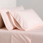 Petal Pink Italian Percale King Sheet Set with two pillowcases, soft long-staple cotton.
