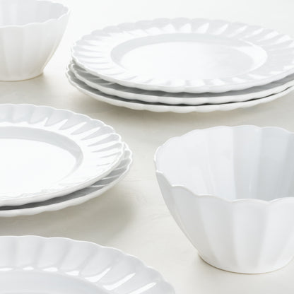White Petal Stoneware Dinner Plates and Bowls with scalloped edges, glazed ceramic, 11.25" diameter.