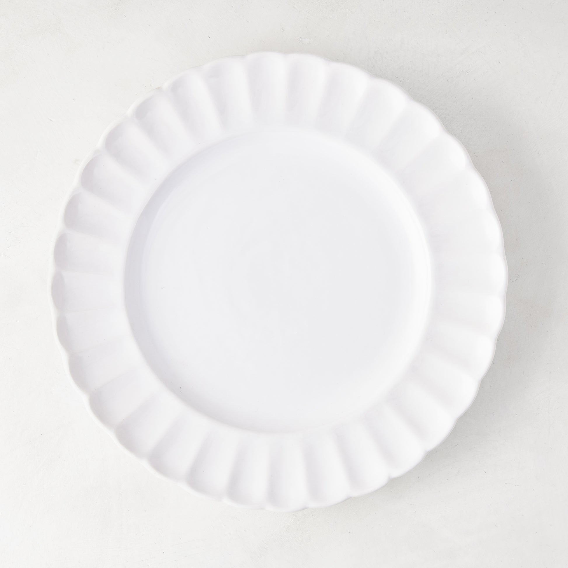 White Petal Stoneware Salad Plate, 9.25" diameter, with vintage-inspired rounded, glazed ceramic edges.