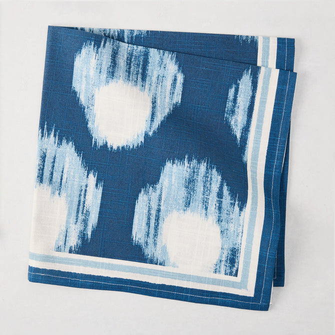 Peter Dunham + Hudson Grace Blue Bukhara Ikat Printed Napkin, 100% cotton slub, folded.