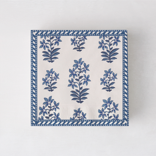 Peter Dunham + Hudson Grace Shani cocktail napkins with blue botanical print and border.