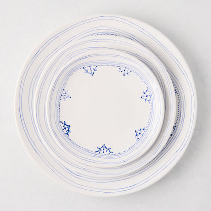 Peter Dunham + Hudson Grace Blue Fez hand-painted border appetizer plate, white with blue lines and dots.