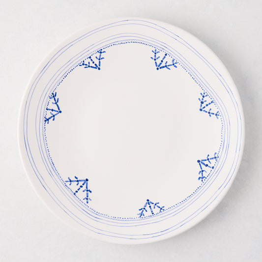 Peter Dunham + Hudson Grace Blue Fez dinner plate, white with hand-painted blue border pattern.